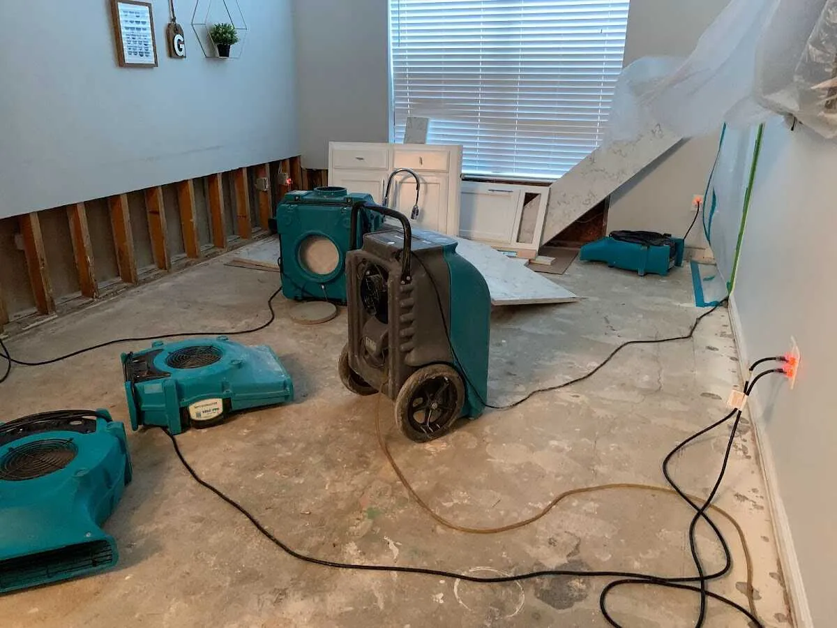 Dehumidifier in flood-cut room for Water Damage Restoration in Kinross